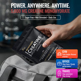 DLNIA Creatine Gummies with workout gear