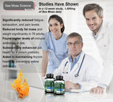 DLNIA Sea Moss All-in-1 Supplement capsules on a wooden table