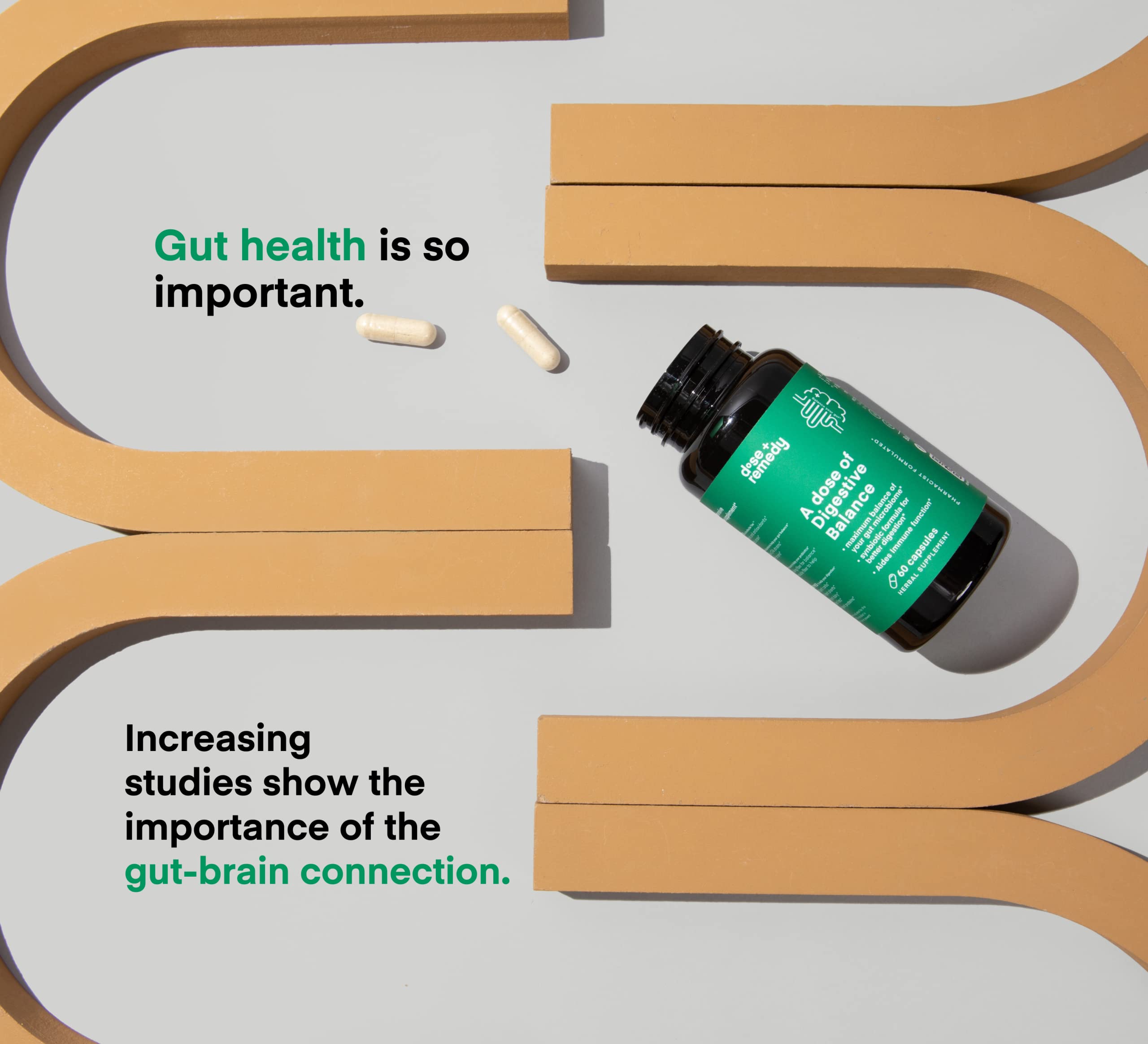 dose + remedy Multi-Enzyme Supplement capsules in a glass