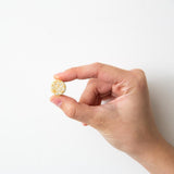 doTERRA a2z Chewable Tablets watermelon flavour with a fresh watermelon slice
