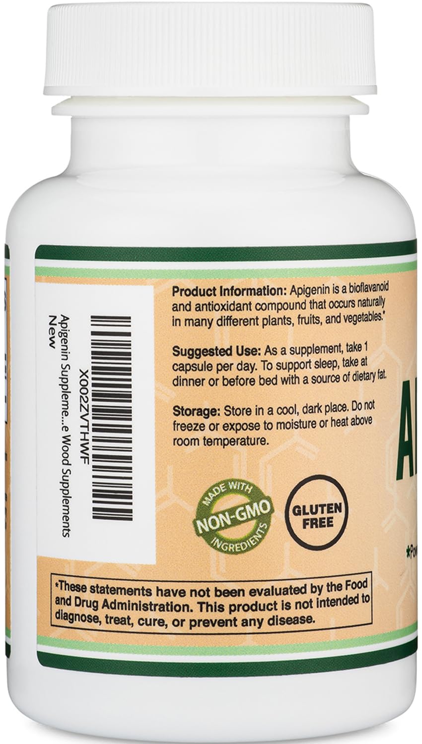 Double Wood Apigenin capsules in a hand