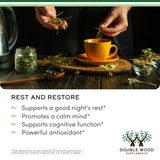 Double Wood Apigenin capsules on a wooden table