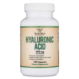 Double Wood Hyaluronic Acid capsules on a wooden surface