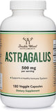 Double Wood Supplements Astragalus Capsules on a wooden table