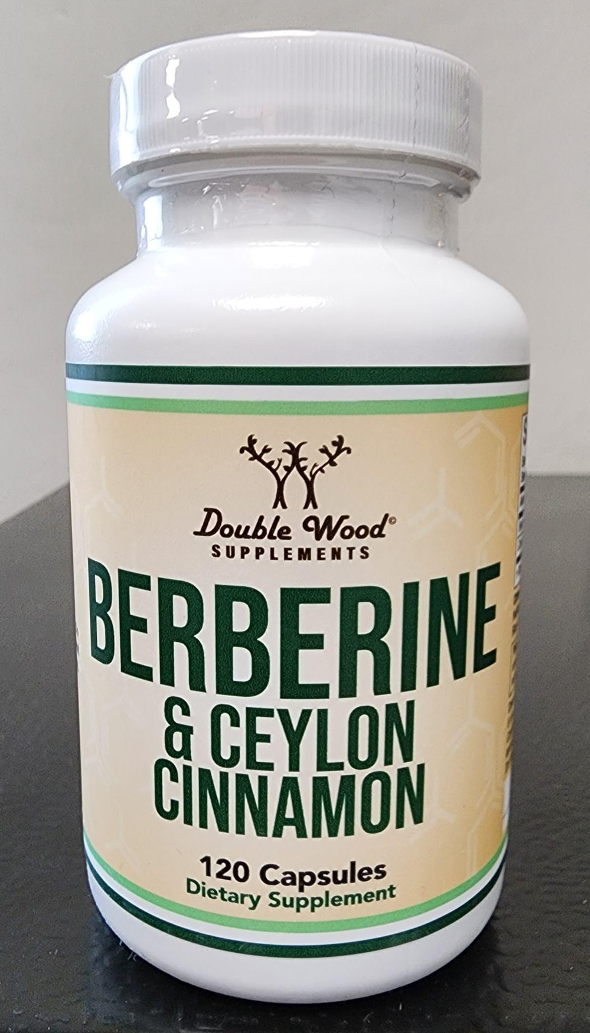 Double Wood Supplements Berberine and Ceylon Cinnamon capsules in a lifestyle setting