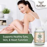 Double Wood Zinc Picolinate capsules in a hand