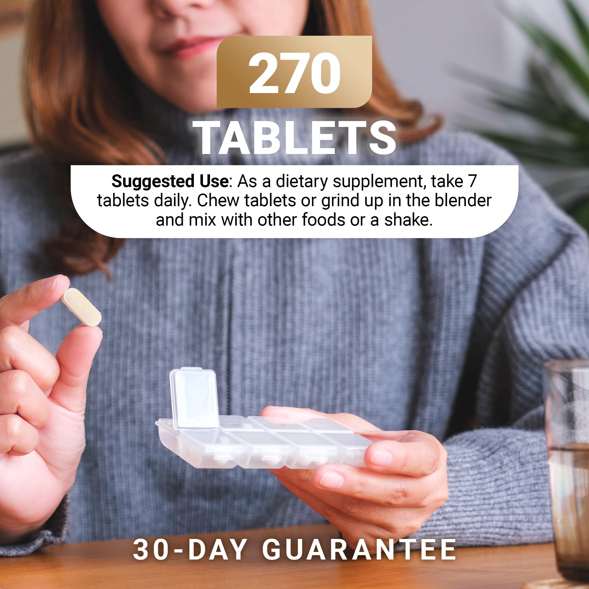 Dr. Berg Nutritionals B-Complex tablets in a hand