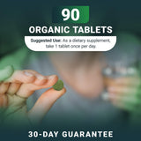 Dr. Berg Nutritionals Organic Vegetable Supplement in a hand