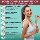 DR. MARTIN'S NUTRITION Sea Moss Trio Capsules with a glass of water