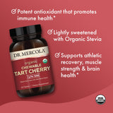 Dr. Mercola Organic Chewable Tart Cherry Tablets on a wooden table