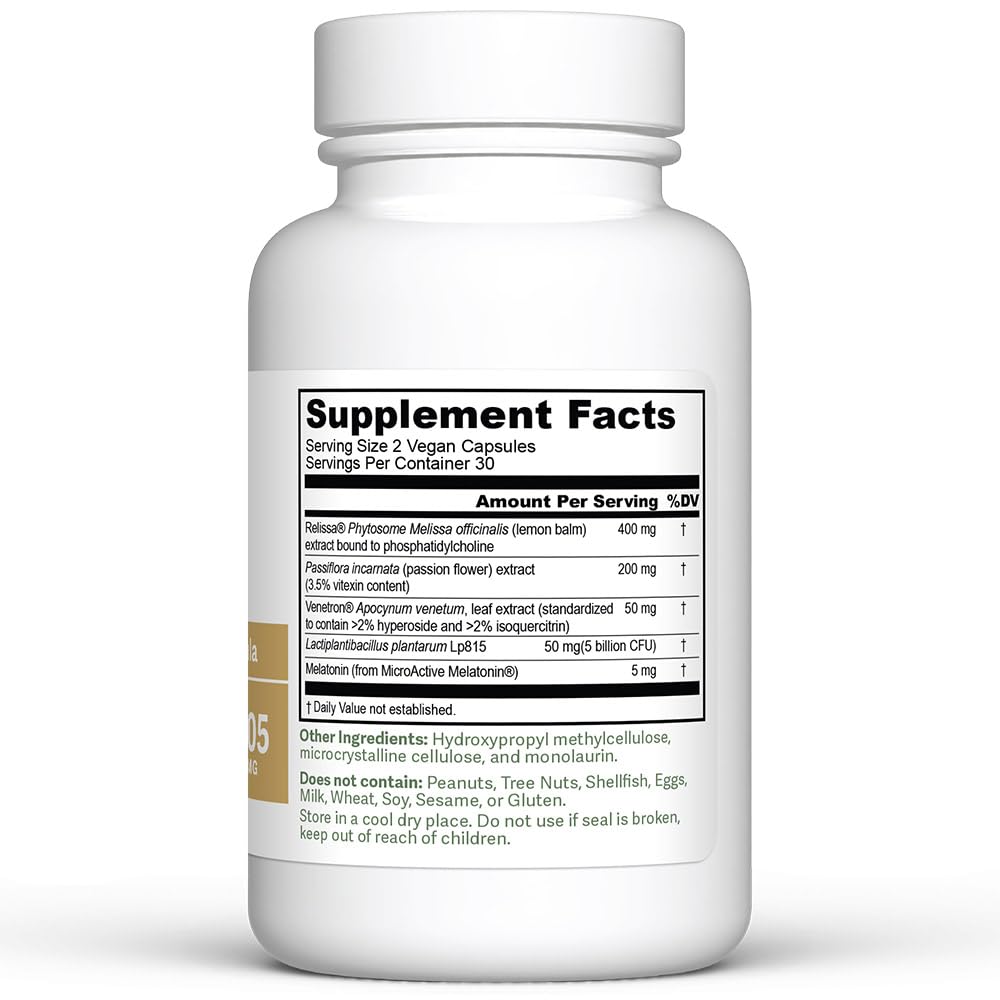 Dr. Murray Ultimate capsules on a wooden surface