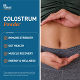 Dr. Tobias Bovine Colostrum Powder scoop with powder