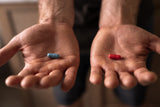 Dream Leaf Pro blue and red capsules close-up