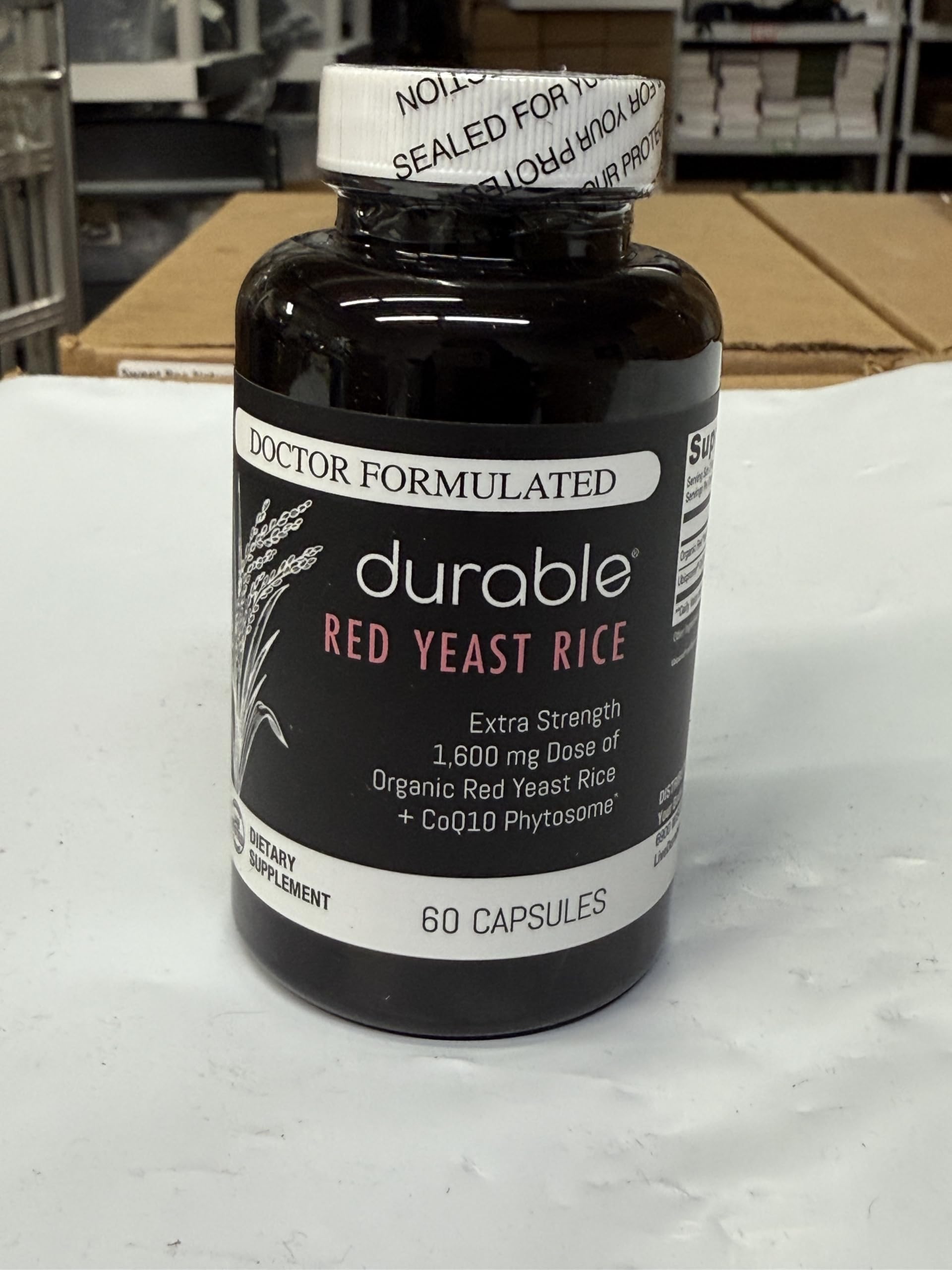Durable CoQ10 Extra-Strength Red Yeast Rice 1600mg capsules opened