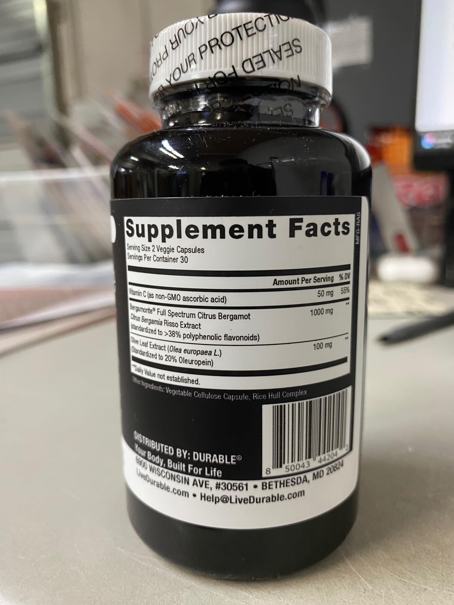 Durable Heart Supplement capsules in hand