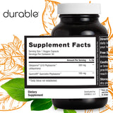 Durable Ubiqsome CoQ10 capsules on a wooden surface