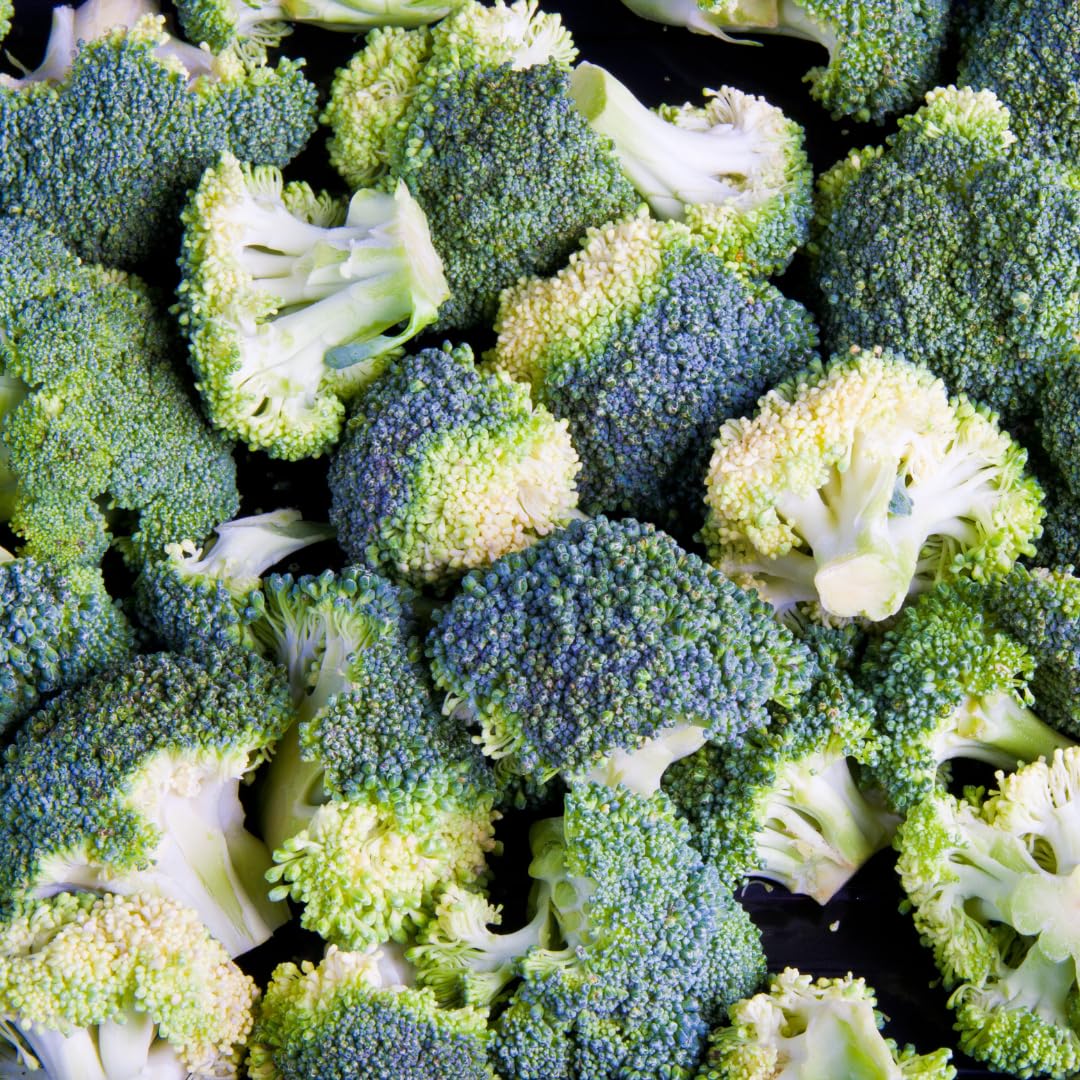 Earthborn Elements Broccoli Extract Capsules on wooden table