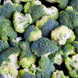 Earthborn Elements Broccoli Extract Capsules on wooden table