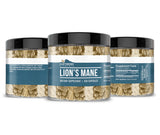 Earthborn Elements Lion’s Mane Capsules on a wooden table