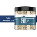 Earthborn Elements Natural Vitamin C Acerola Cherry capsules on a wooden table
