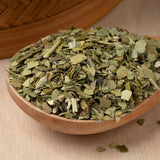 Earthborn Elements Yerba Mate Leaf Capsules with a measuring spoon