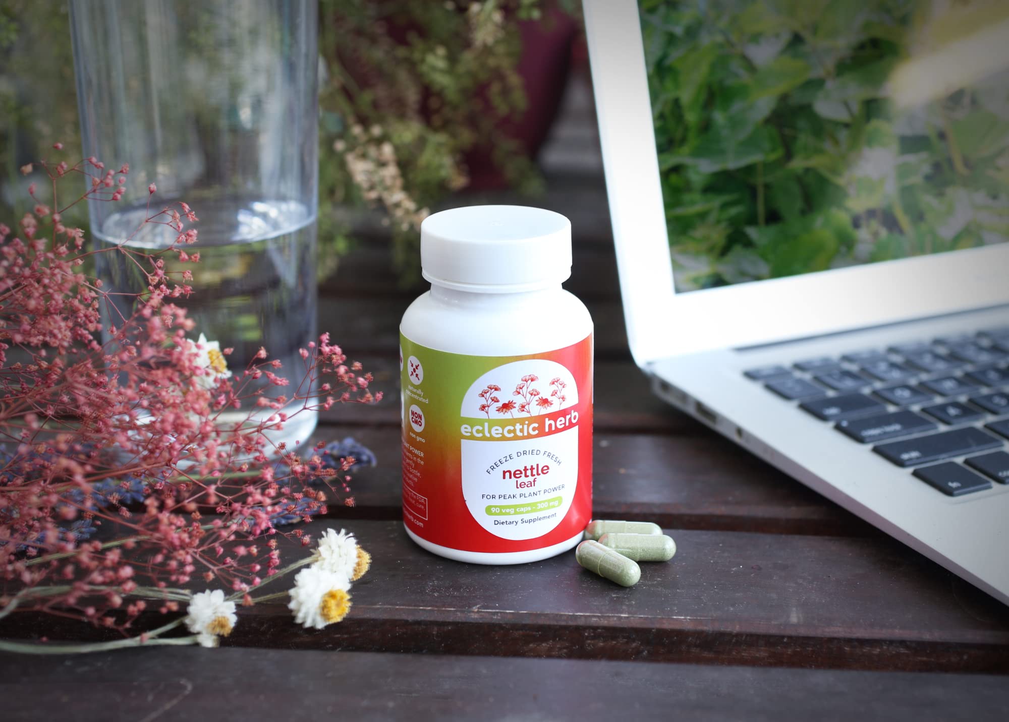 ECLECTIC INSTITUTE Nettle Leaf Capsules on a wooden table