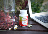 ECLECTIC INSTITUTE Nettle Leaf Capsules on a wooden table