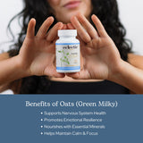 ECLECTIC INSTITUTE Oats Capsules on a wooden table