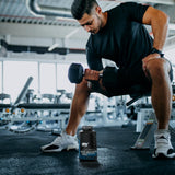 EFX Sports Kre Alkalyn Pro Creatine Capsules with workout gear