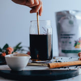 Elanen Naturals Organic Elderberry Syrup kit displayed with herbs