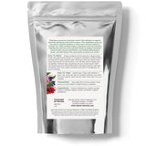Elanen Naturals Organic Elderberry Syrup Kit on a wooden table