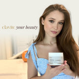 Elavite Bovine Colostrum Powder in a clear glass with water