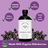 Elderlane Elderberry Syrup packaging with a honey dipper