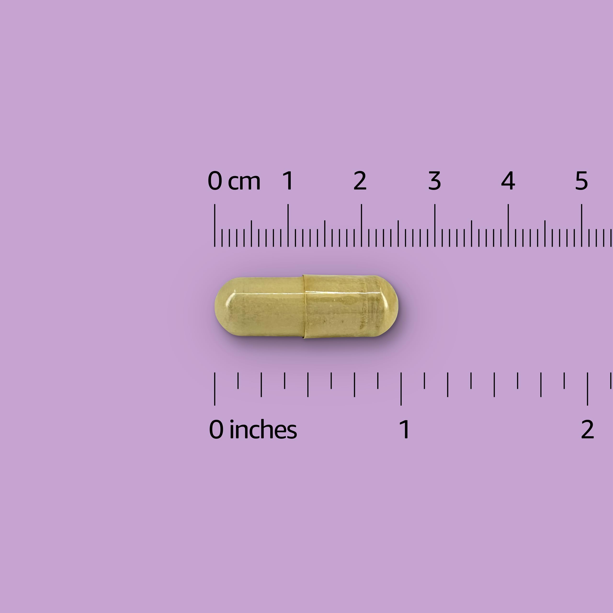 Elements Trans-Resveratrol Supplement capsules on a wooden surface