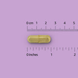 Elements Trans-Resveratrol Supplement capsules on a wooden surface