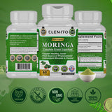 ELEMITO Moringa Oleifera Leaf Powder Capsules on a wooden table