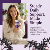 ELVERA Organic Black Elderberry Capsules with a measuring spoon
