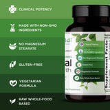 EMERALD LABS Adrenal Support Supplement bottle with capsules on a wooden table