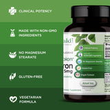 EMERALD LABS Gentle Iron Supplement capsules on a wooden surface