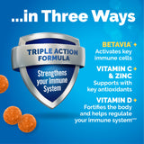 Emergen-C daily wellness+ Triple Action gummies on a wooden table