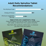 ENERGYBITS Chlorella and Spirulina Tablets on a wooden table