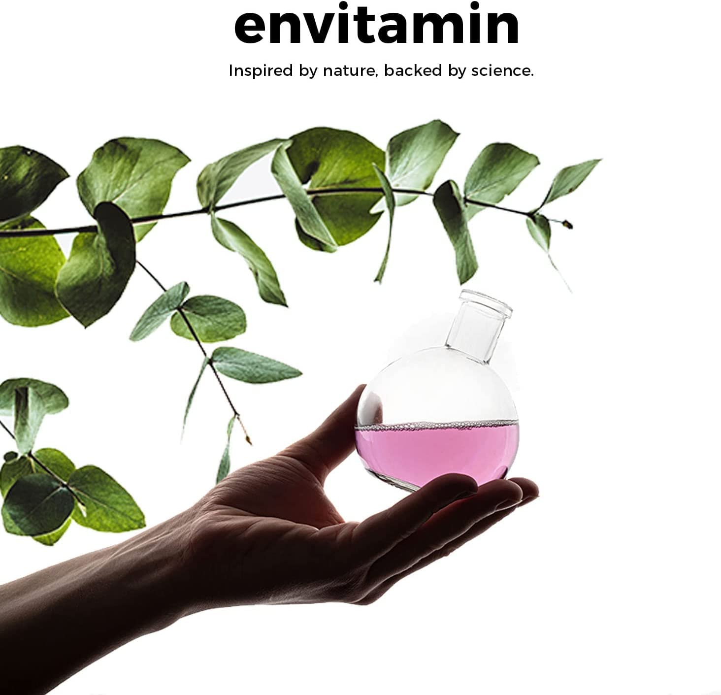 envitamin Ultimate Multivitamin capsules in a glass