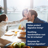 Enzyme Science Acid Calm supplement with a glass of water