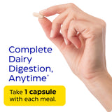 Enzymedica Lactase Supplement in hand for size reference