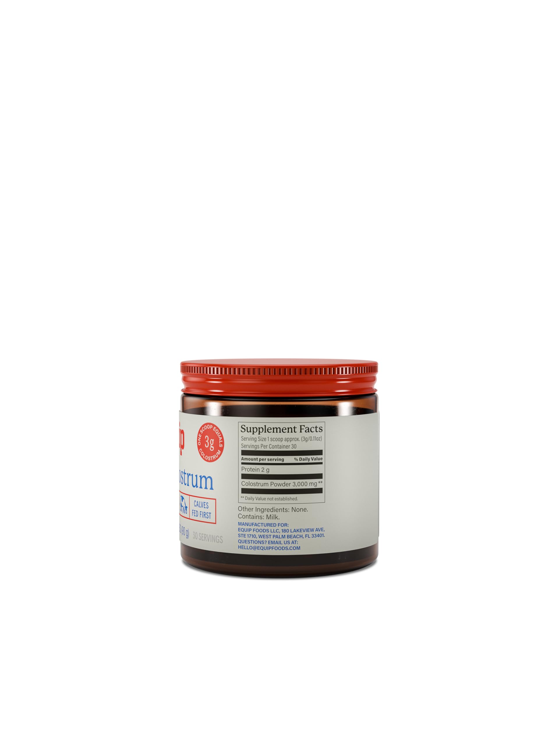 Equip Core Colostrum Bovine Powder with measuring scoop on a kitchen counter