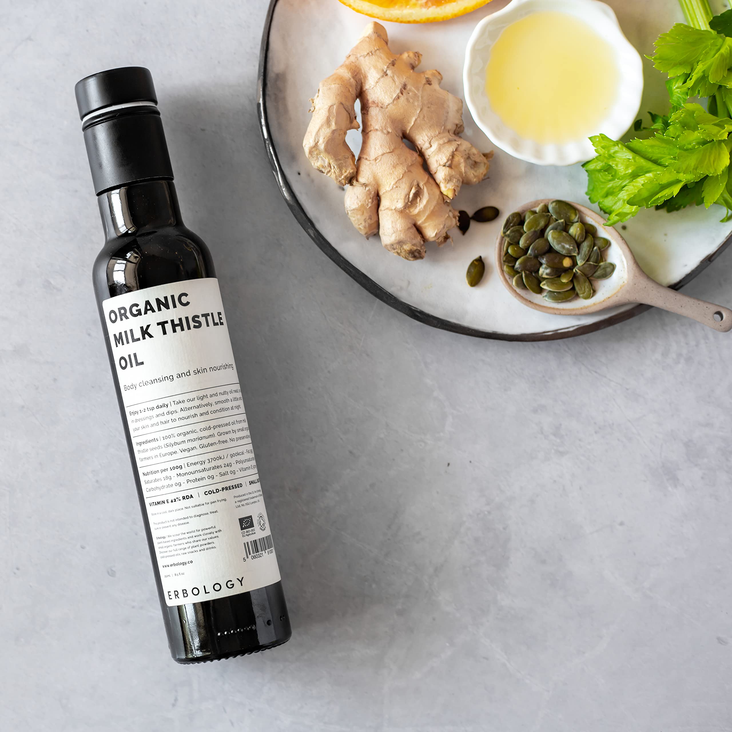 Erbology Milk Thistle Oil 400g with a salad dressing