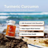 Essential Elements Turmeric Curcumin Supplement close-up of capsules