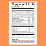 Eudaimona Multivitamin Liquid Supplement in a glass with fruit