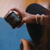 Eversio Wellness Organic Reishi Mushroom Capsules with a measuring spoon