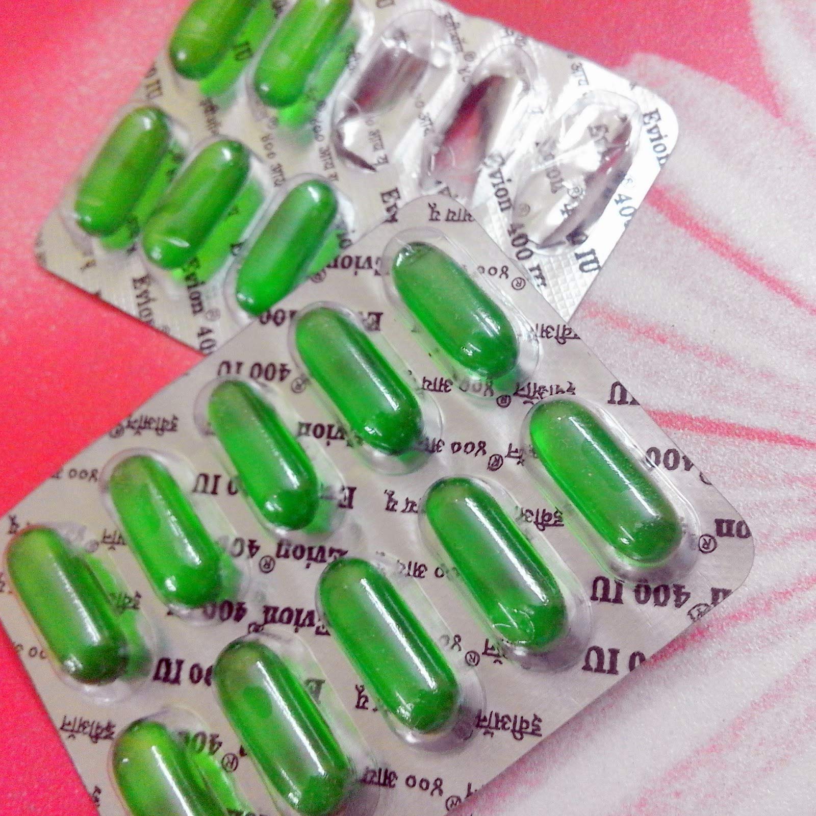 evion Vitamin E Capsules 400mg side view showing dosage information